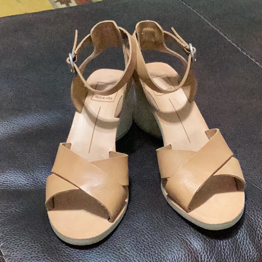 Dolce Vita sandal. Saddle colored leather with unique heel.